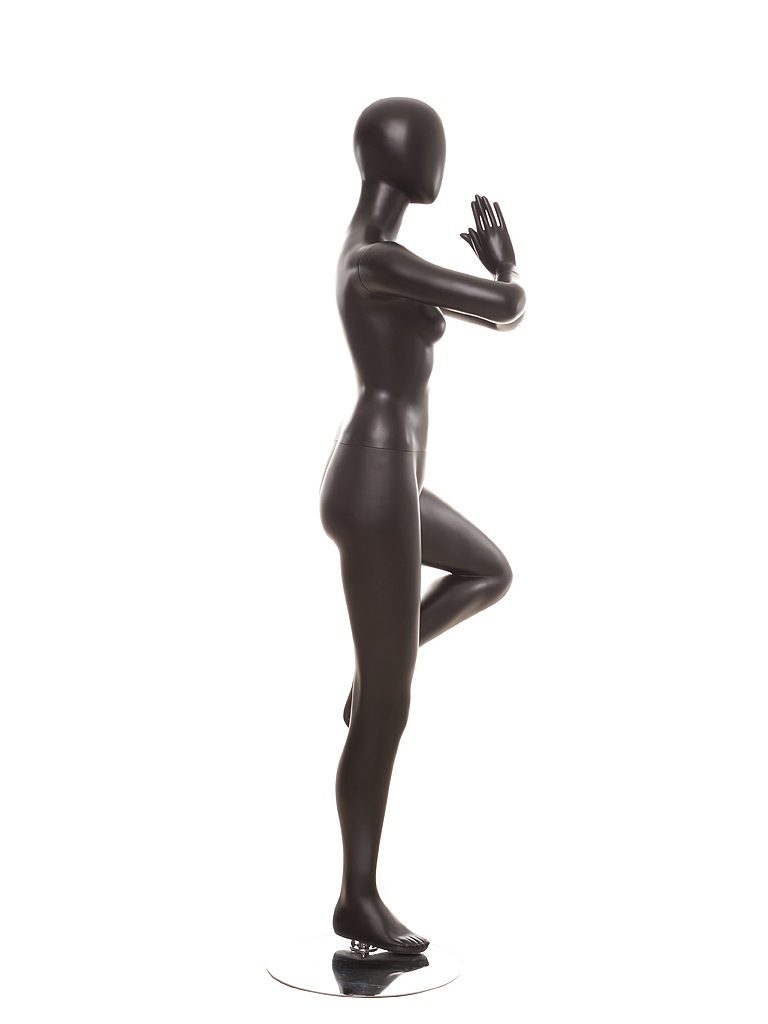 Matte Black Abstract Yoga Egg Head Female Mannequin MM-YOGA2BKSP Female mannequin with abstract faceless features, practicing yoga in Tree pose with base. Made of matte black fiberglass. Detachable arms, hands, torso and one leg make them easy to dress. You can sell more athletic wear when using mannequins in active poses like this one.