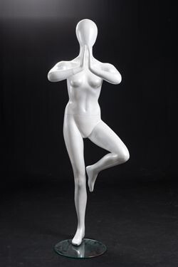 Gloss White Abstract Yoga Egg Head Female Mannequin MM-YOGA2W Female mannequin with abstract faceless features, practicing yoga in Tree pose with base. Made of gloss white fiberglass. Detachable arms, hands, torso and one leg make them easy to dress, comes with a metal round base.